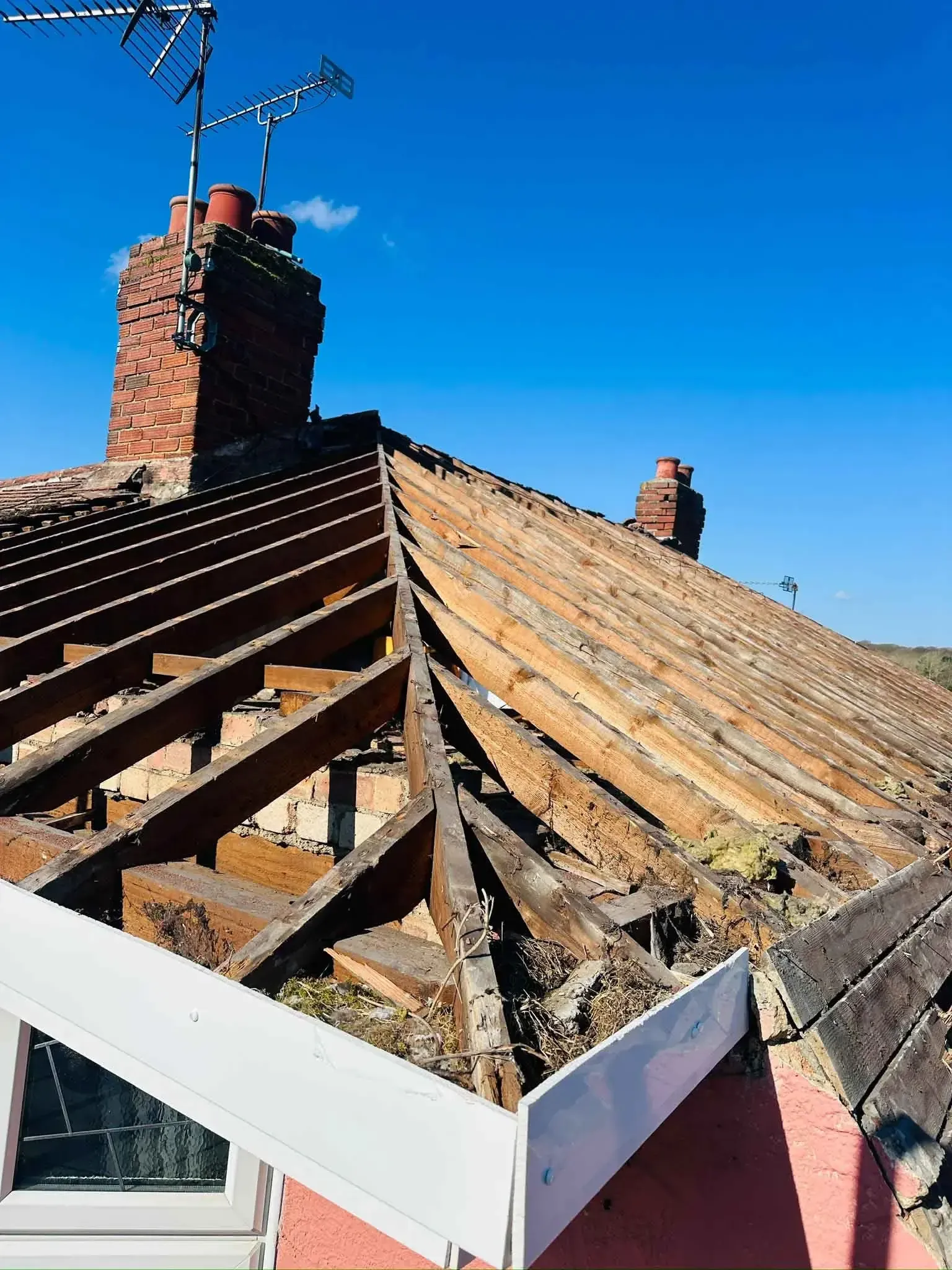 Roof stripped back to its structural timbers on a house in Bracknell, Berkshire