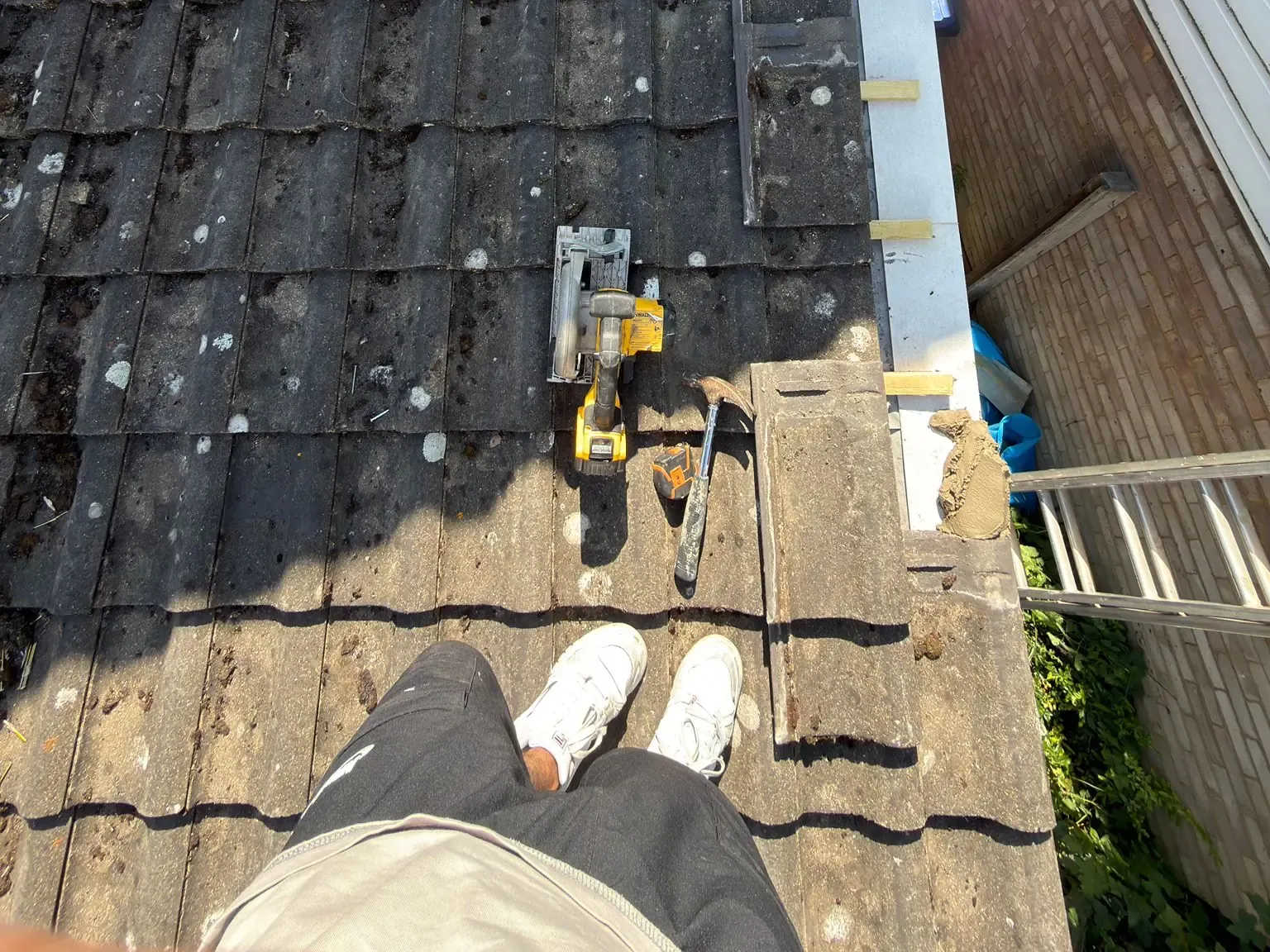 Repaired roof section in Ascot, Berkshire, with the covering reinstated and cement verge renewed