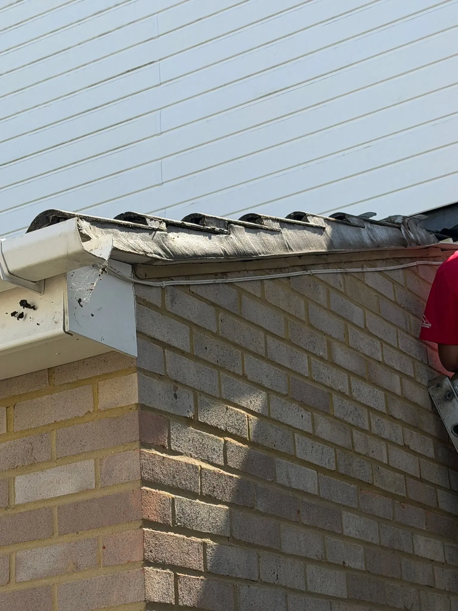 Renewed cement verge detail toward the upper roof edge during an Ascot roof repair