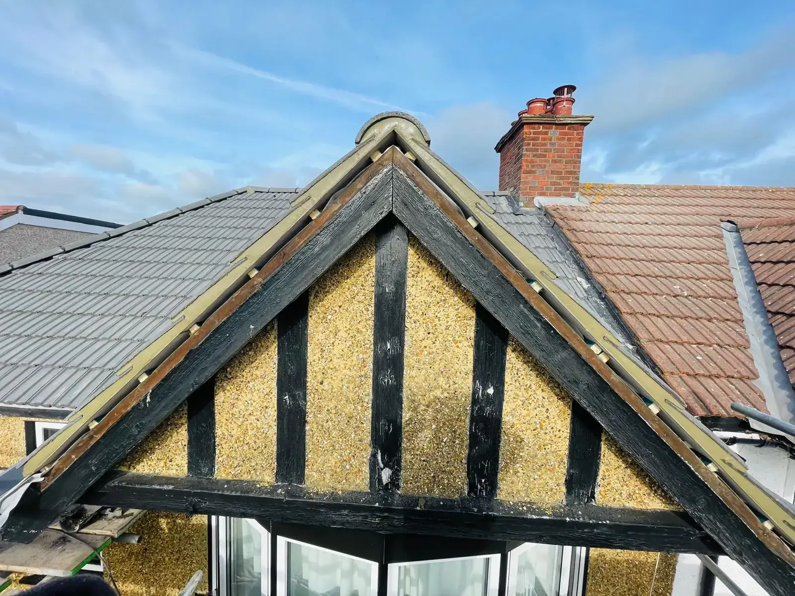 Gable roof with cement or mortar work along both verges in Camberley, Surrey