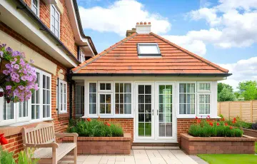 A tiled conservatory roof on a brick home