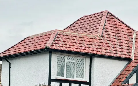 Redland 49 roof tiles in Rustic Red on a client-confirmed new-roof project in Godalming